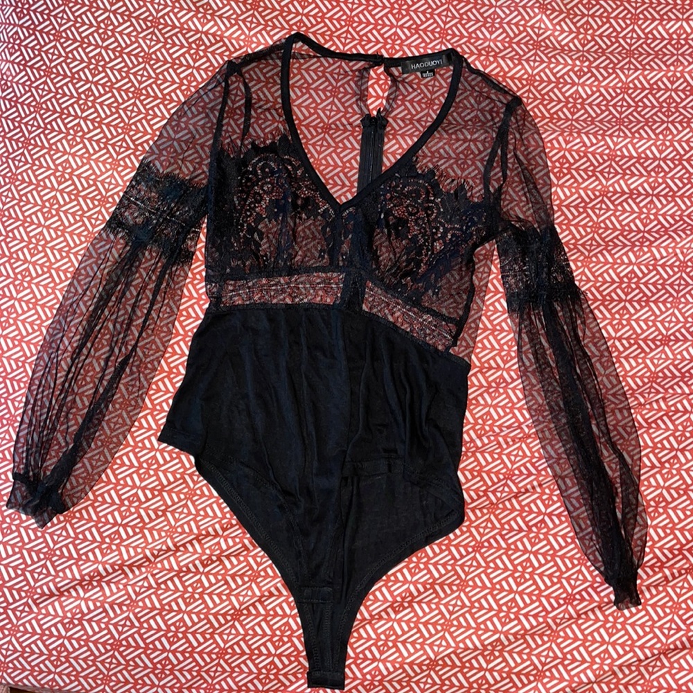Black sexy sheer/lace bodysuit